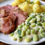 Geräucherter Schweinenacken mit dicken Bohnen